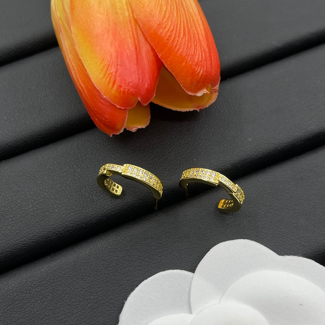 Chaumet pave huggie hoop earrings in Gold Tone, detail view 17
