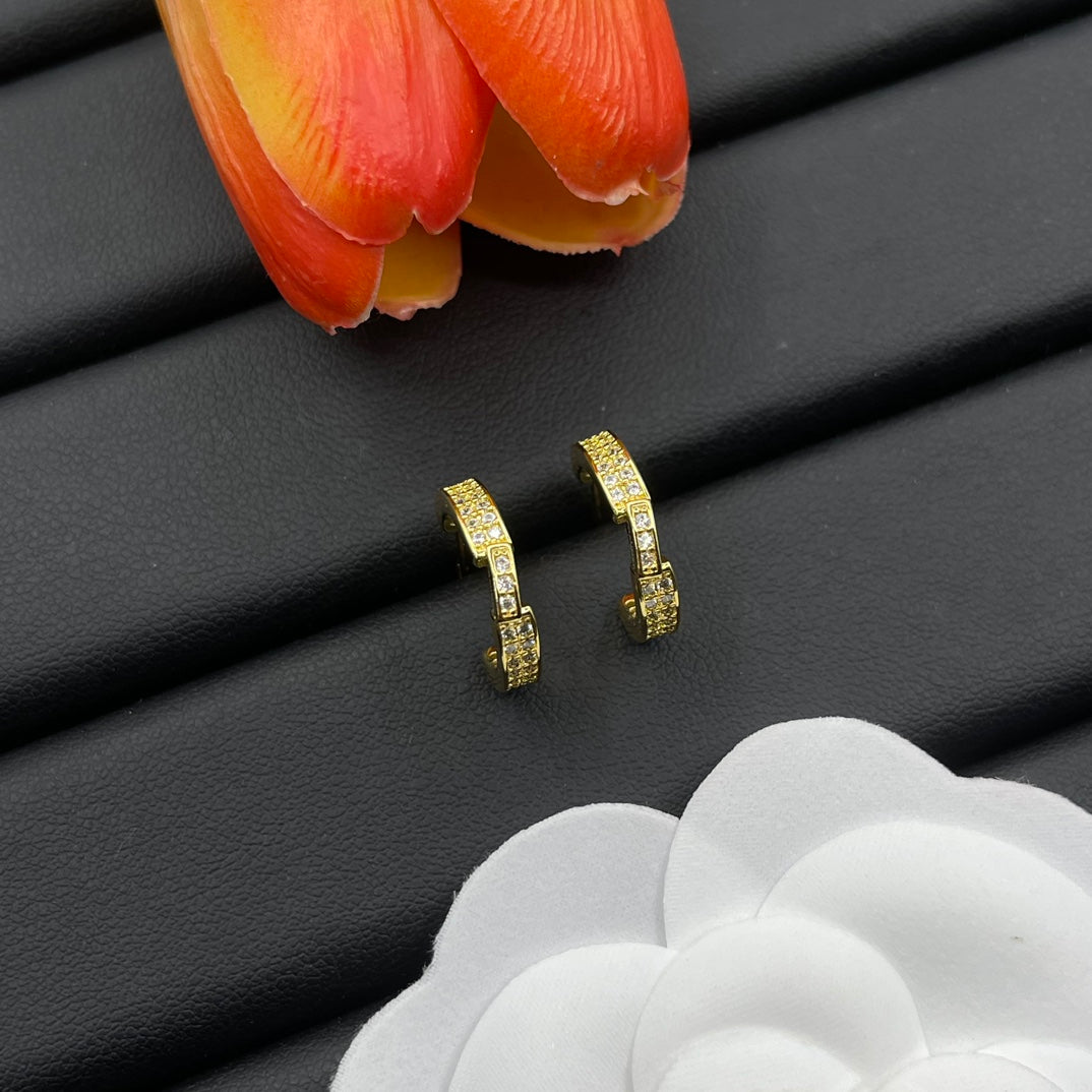 Chaumet pave huggie hoop earrings in Gold Tone, detail view 16