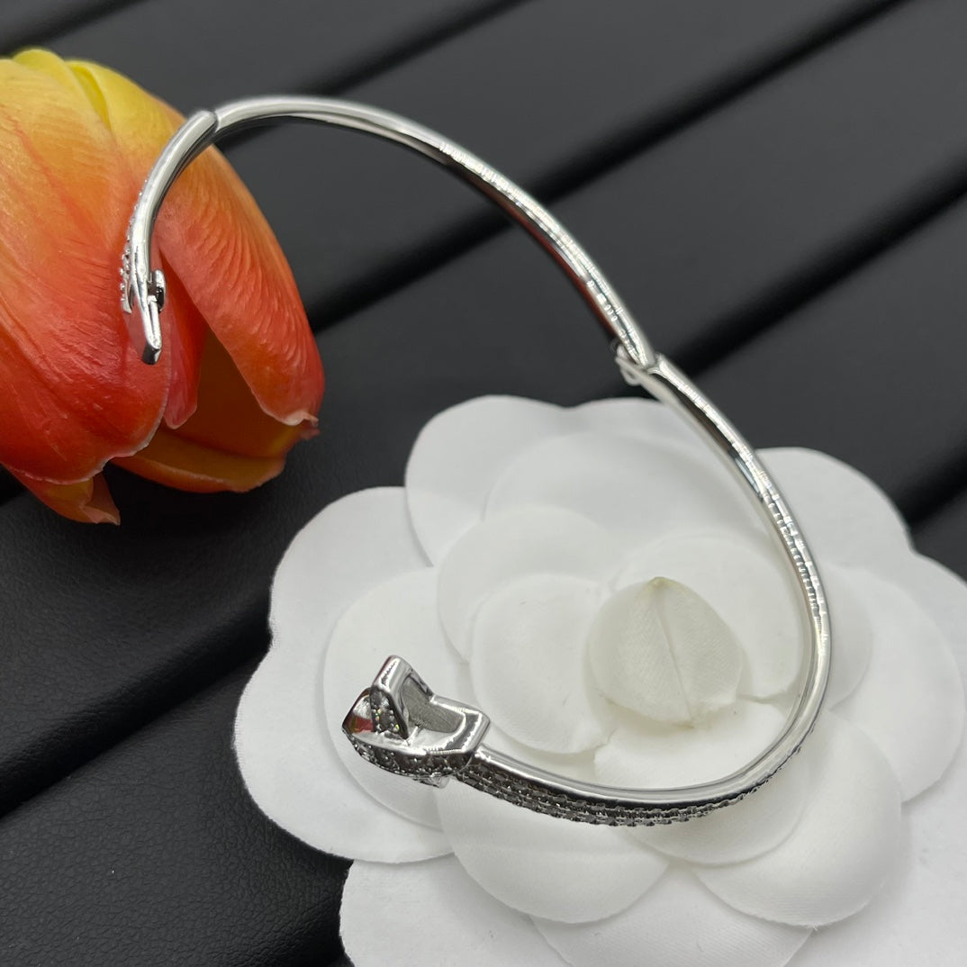 Chaumet full pave bow bangle bracelet in Silver Tone, detail view 12