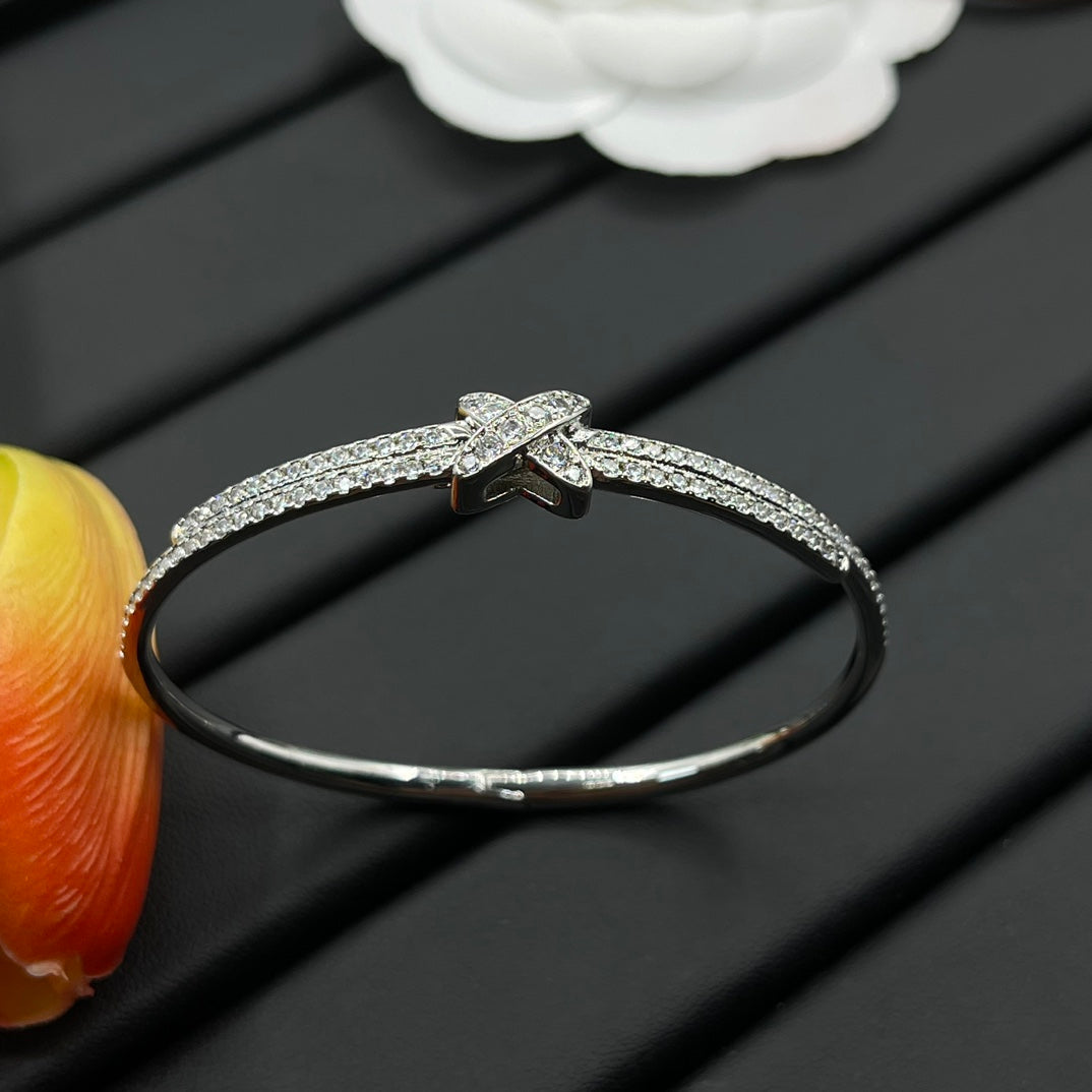 Chaumet full pave bow bangle bracelet in Silver Tone, detail view 10