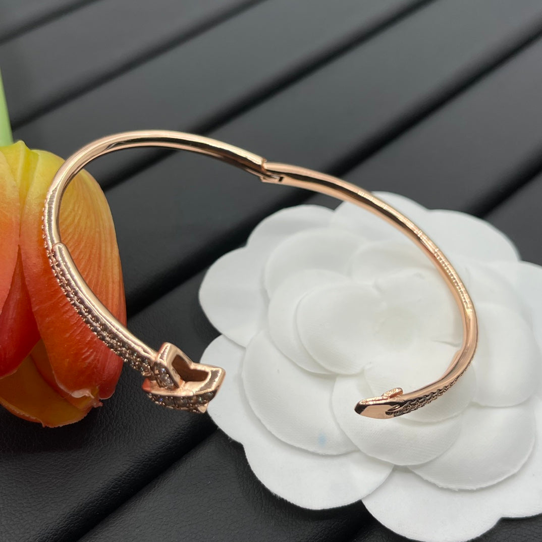 Chaumet full pave bow bangle bracelet in Rose Gold Tone, detail view 19