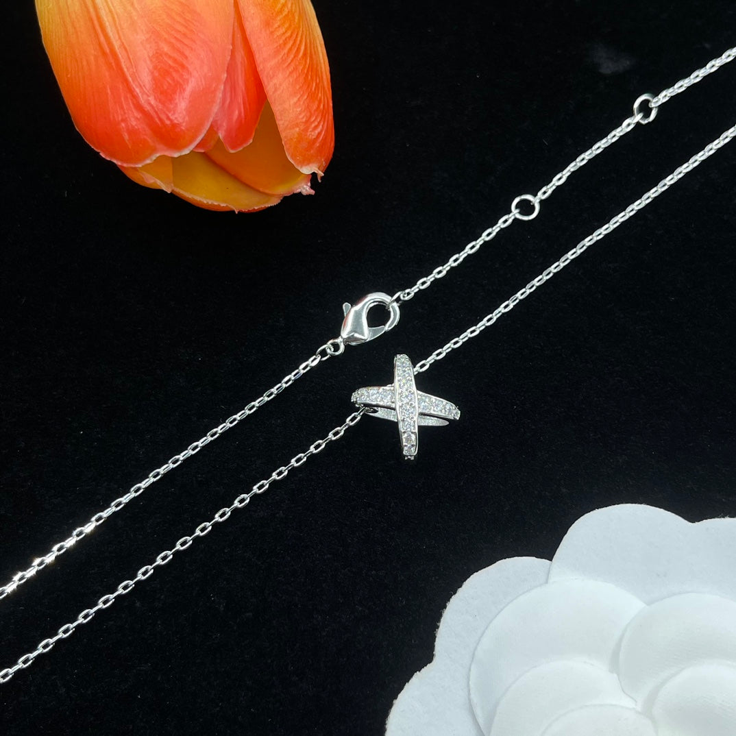 Chaumet crystal star cross pendant necklace in Silver Tone, detail view 2