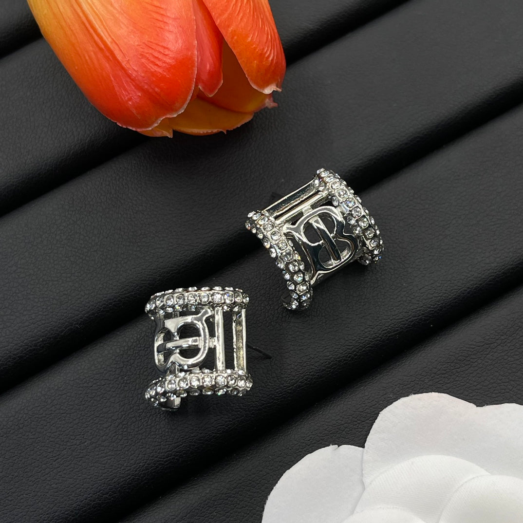 Burberry clear crystal frame stud earrings in Silver Tone, detail view 10