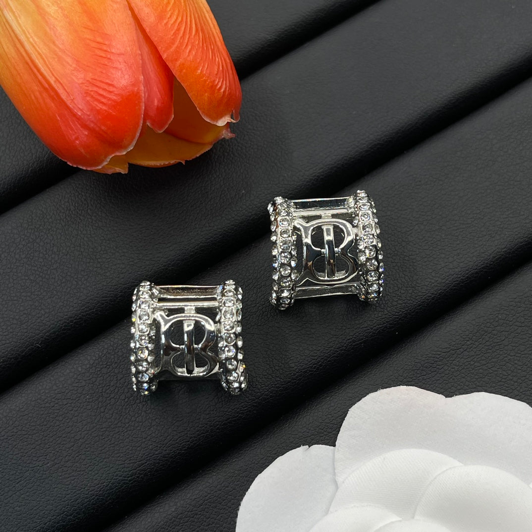Burberry clear crystal frame stud earrings in Silver Tone, detail view 9