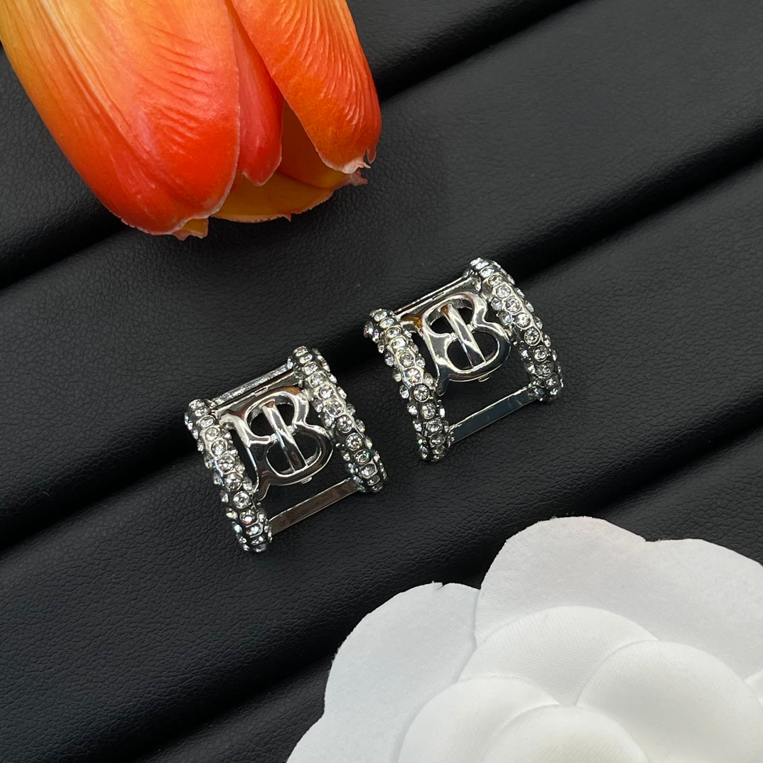 Burberry clear crystal frame stud earrings in Silver Tone, detail view 8