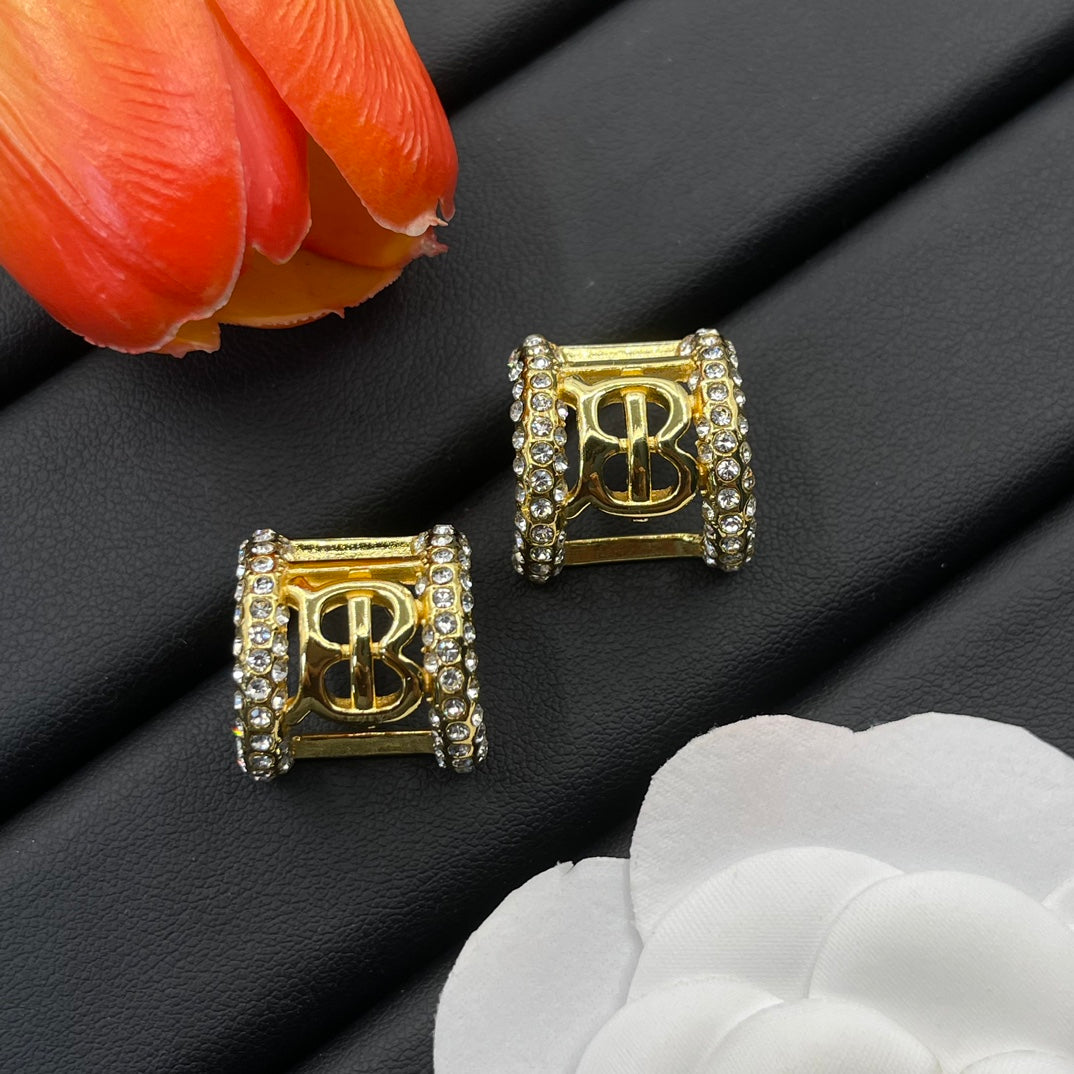 Burberry clear crystal frame stud earrings in Gold Tone, detail view 2