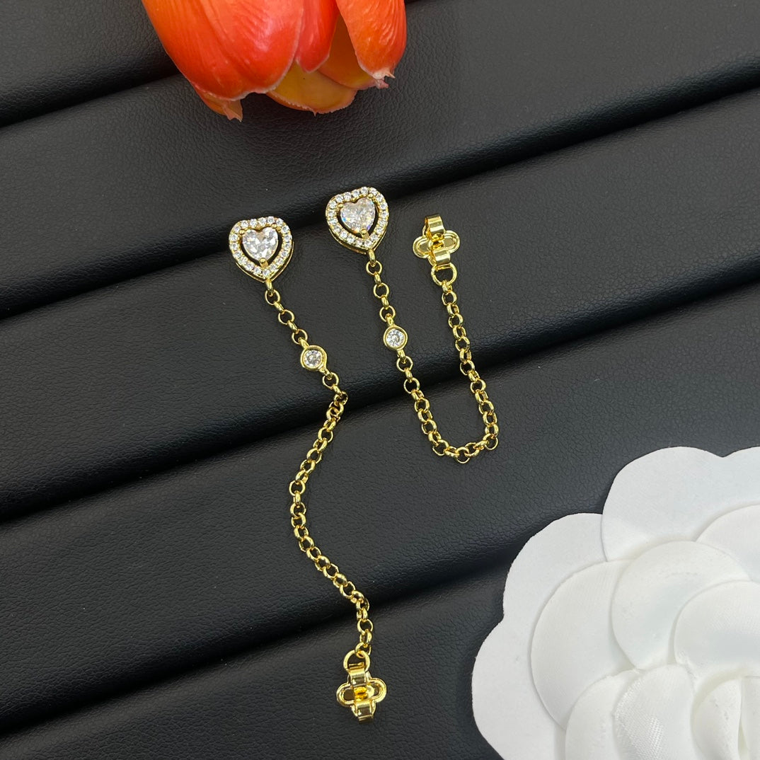 Messika Heart Chain Drop earrings in Gold Tone, detail view 3