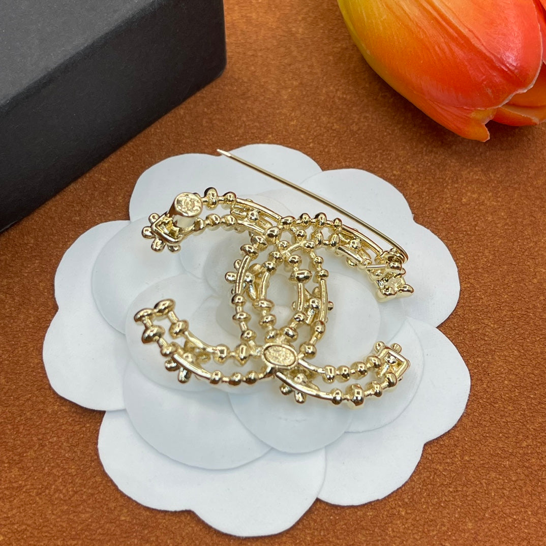 Chanel style brooches - product photo 5