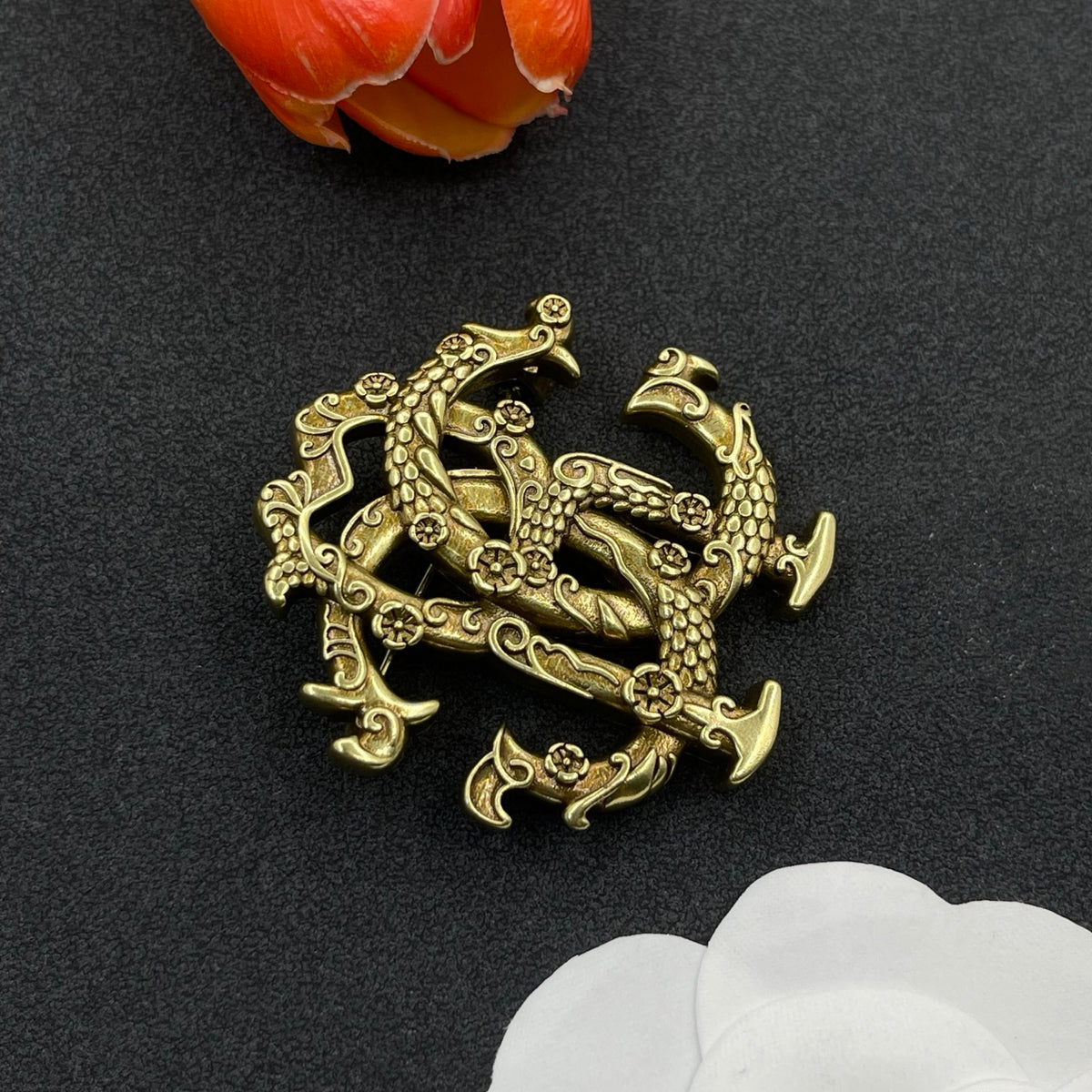 Roberto Cavalli sculpted RC monogram brooch in Antique Gold Tone, detail view 2