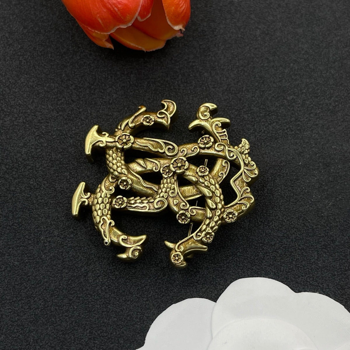 Roberto Cavalli sculpted RC monogram brooch in Antique Gold Tone, detail view 3