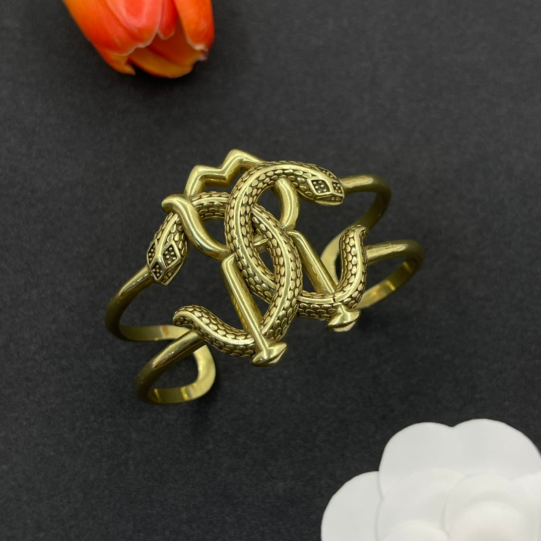 Roberto Cavalli open cuff bracelet with RC monogram in Antique Gold Tone, detail view 2