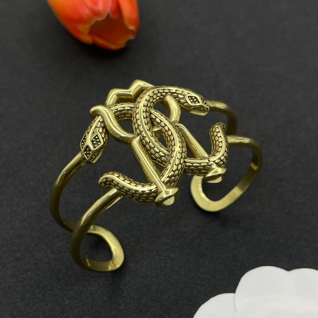 Roberto Cavalli open cuff bracelet with RC monogram in Antique Gold Tone, main view