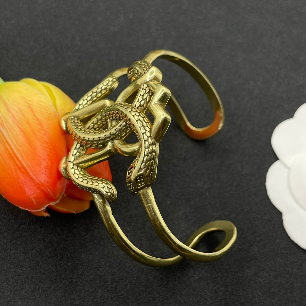 Roberto Cavalli open cuff bracelet with RC monogram in Antique Gold Tone, detail view 4