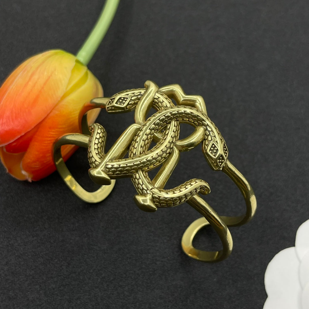 Roberto Cavalli open cuff bracelet with RC monogram in Antique Gold Tone, detail view 3