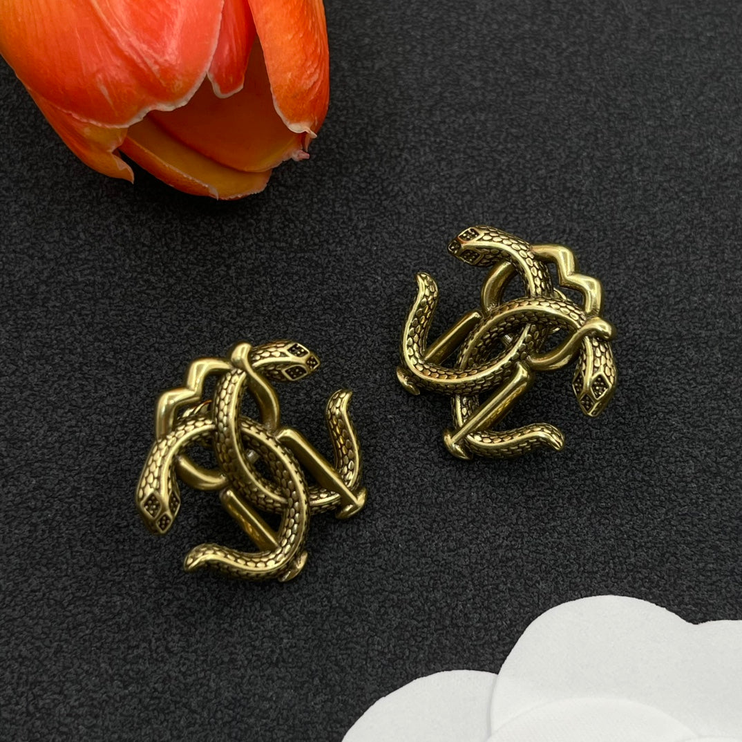 Roberto Cavalli RC monogram stud earrings in Antique Gold Tone, detail view 2