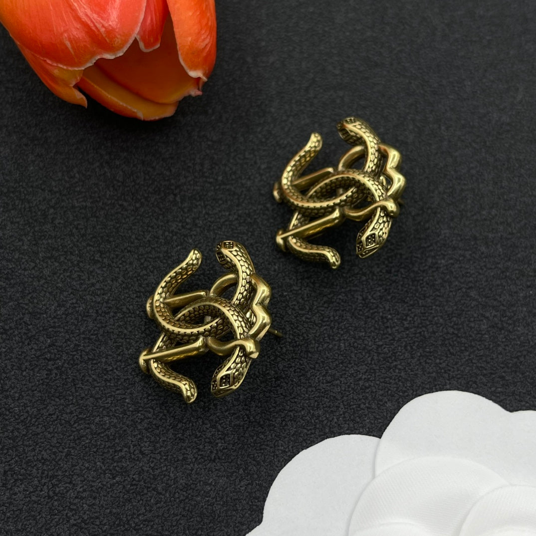 Roberto Cavalli RC monogram stud earrings in Antique Gold Tone, detail view 3