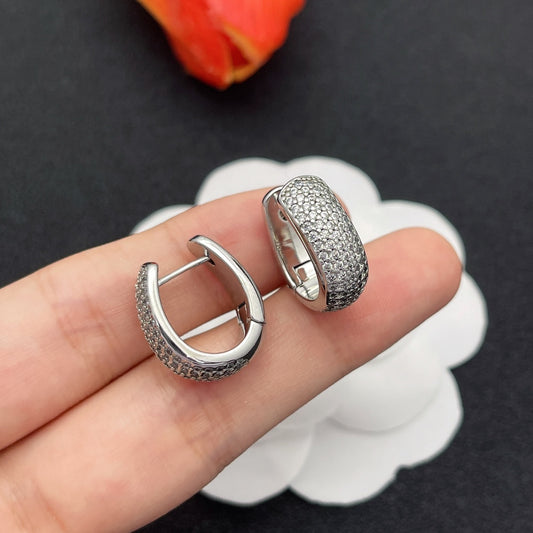 Pomellato pave crystal dome huggie hoop earrings in Silver Tone, main view