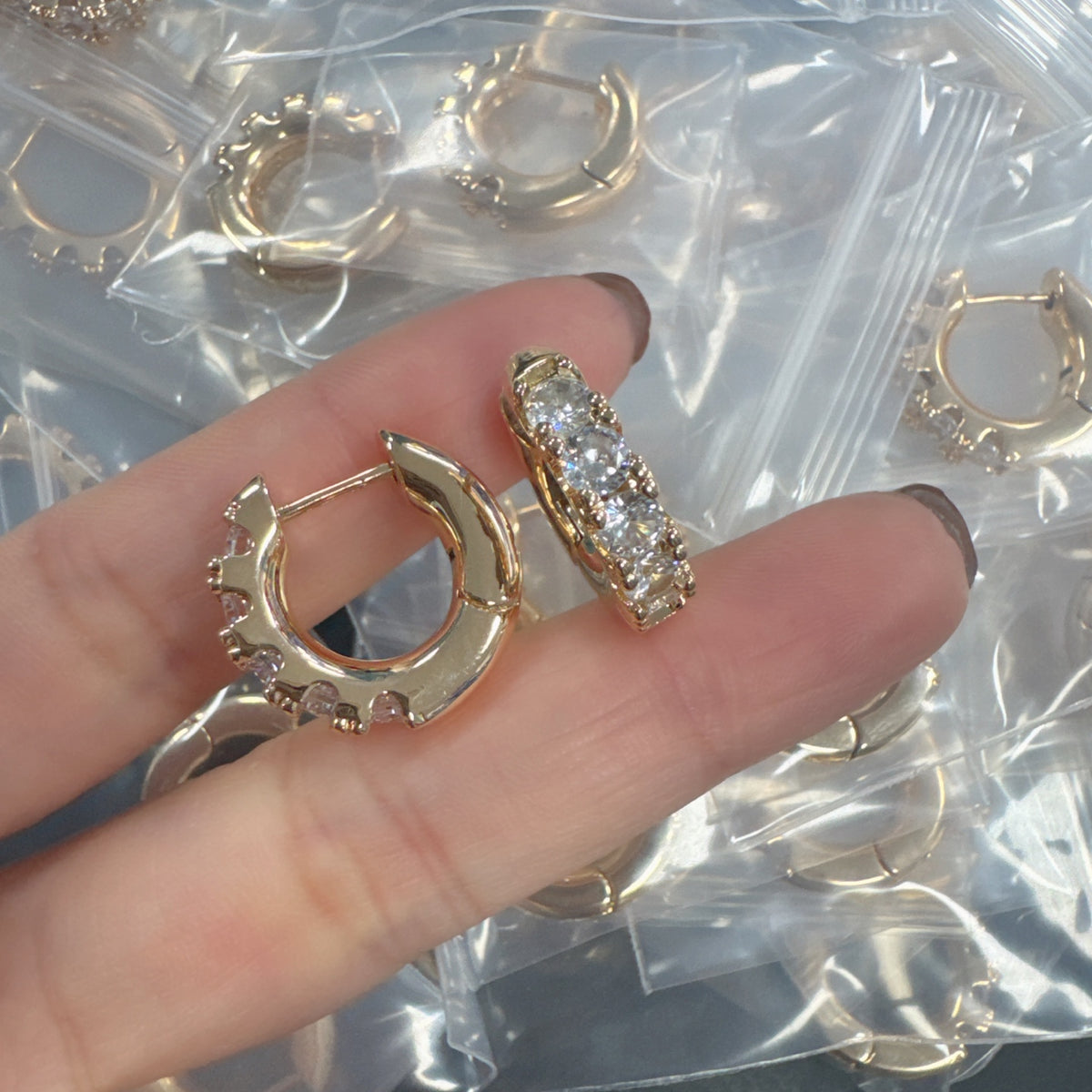 Sif Jakobs graduated crystal huggie hoop earrings in Gold Tone, detail view 16