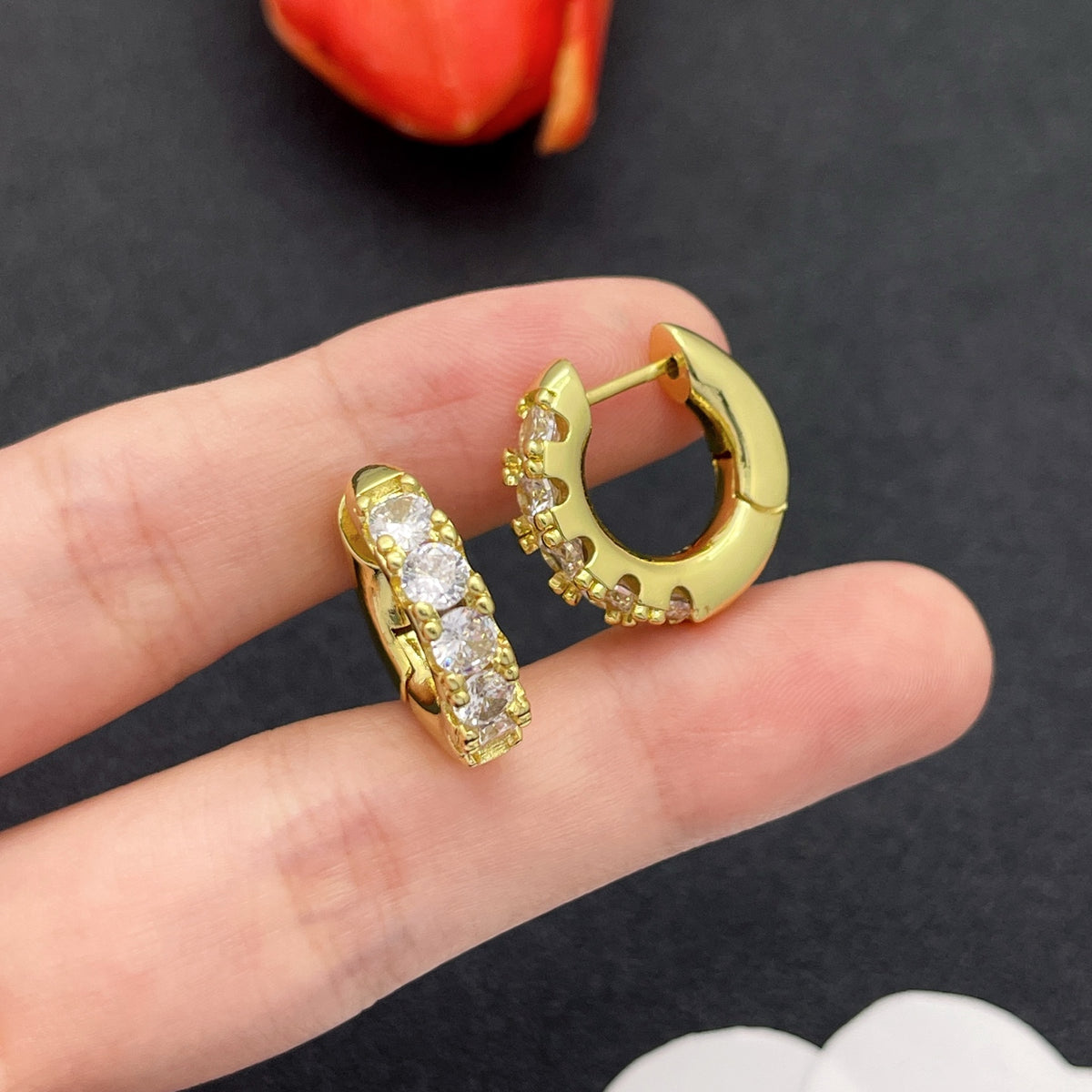 Sif Jakobs graduated crystal huggie hoop earrings in Gold Tone, detail view 9