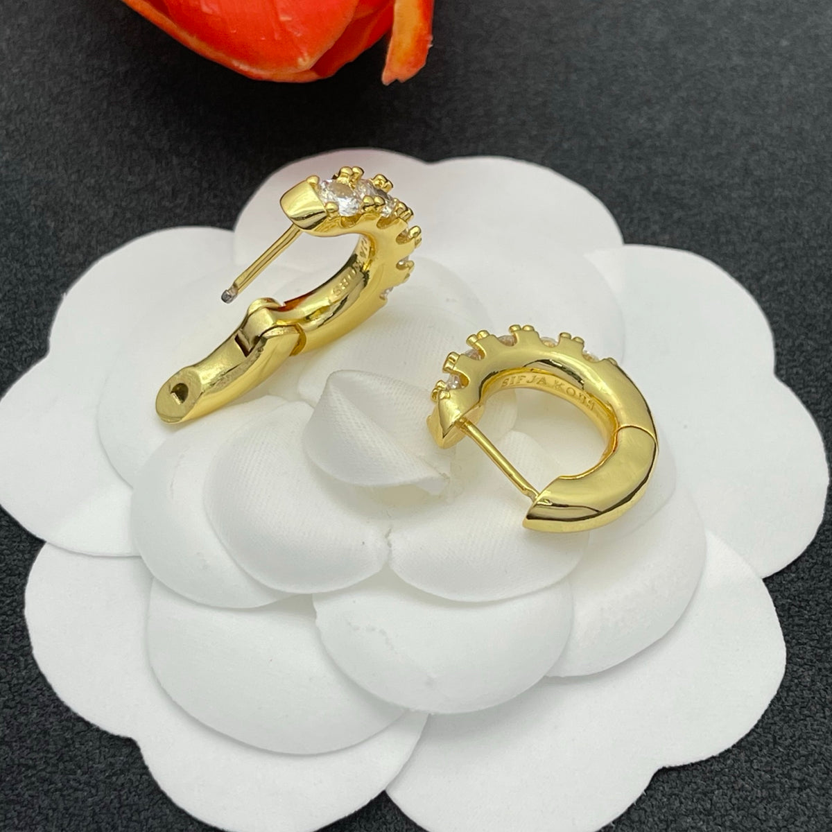 Sif Jakobs graduated crystal huggie hoop earrings in Gold Tone, detail view 14