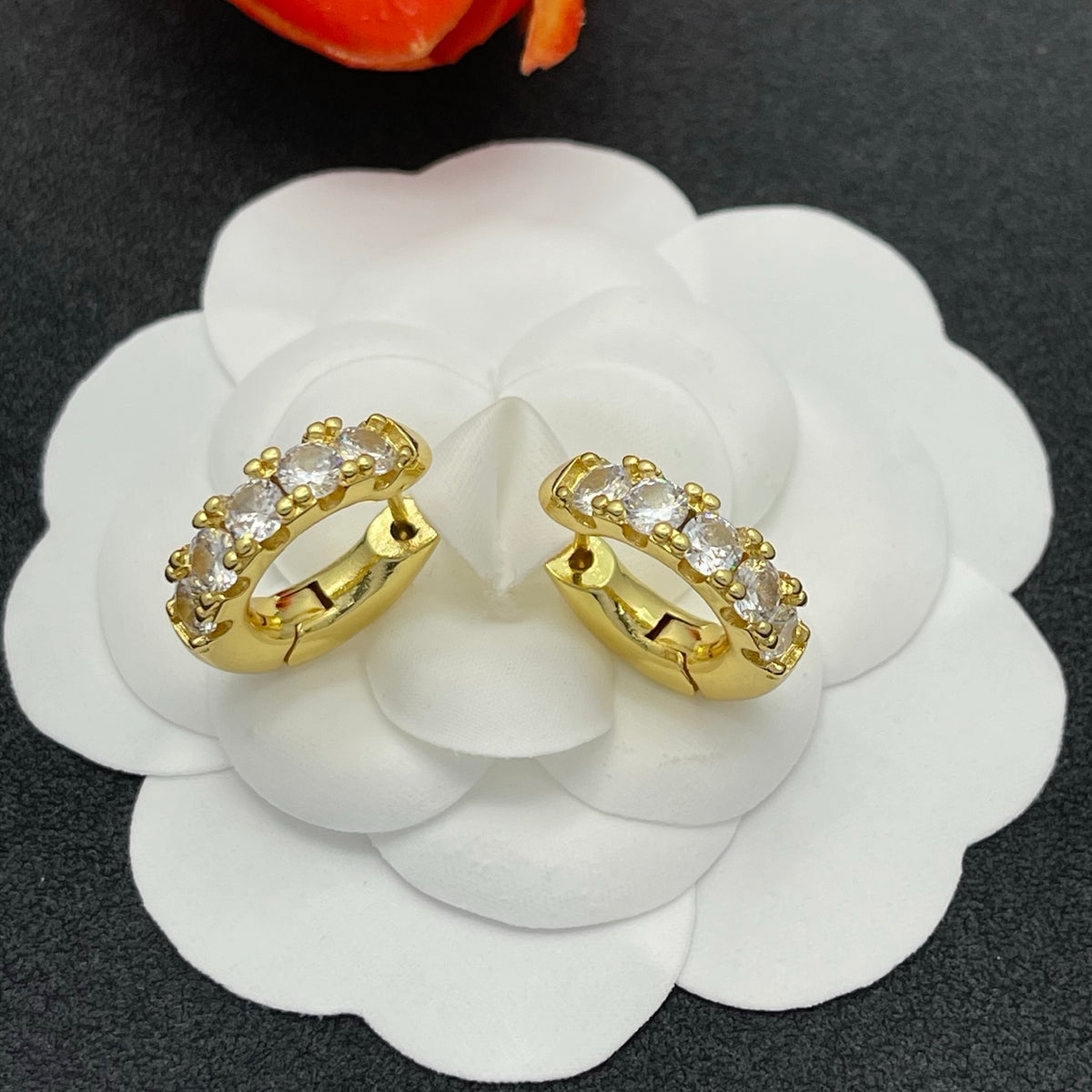 Sif Jakobs graduated crystal huggie hoop earrings in Gold Tone, detail view 11