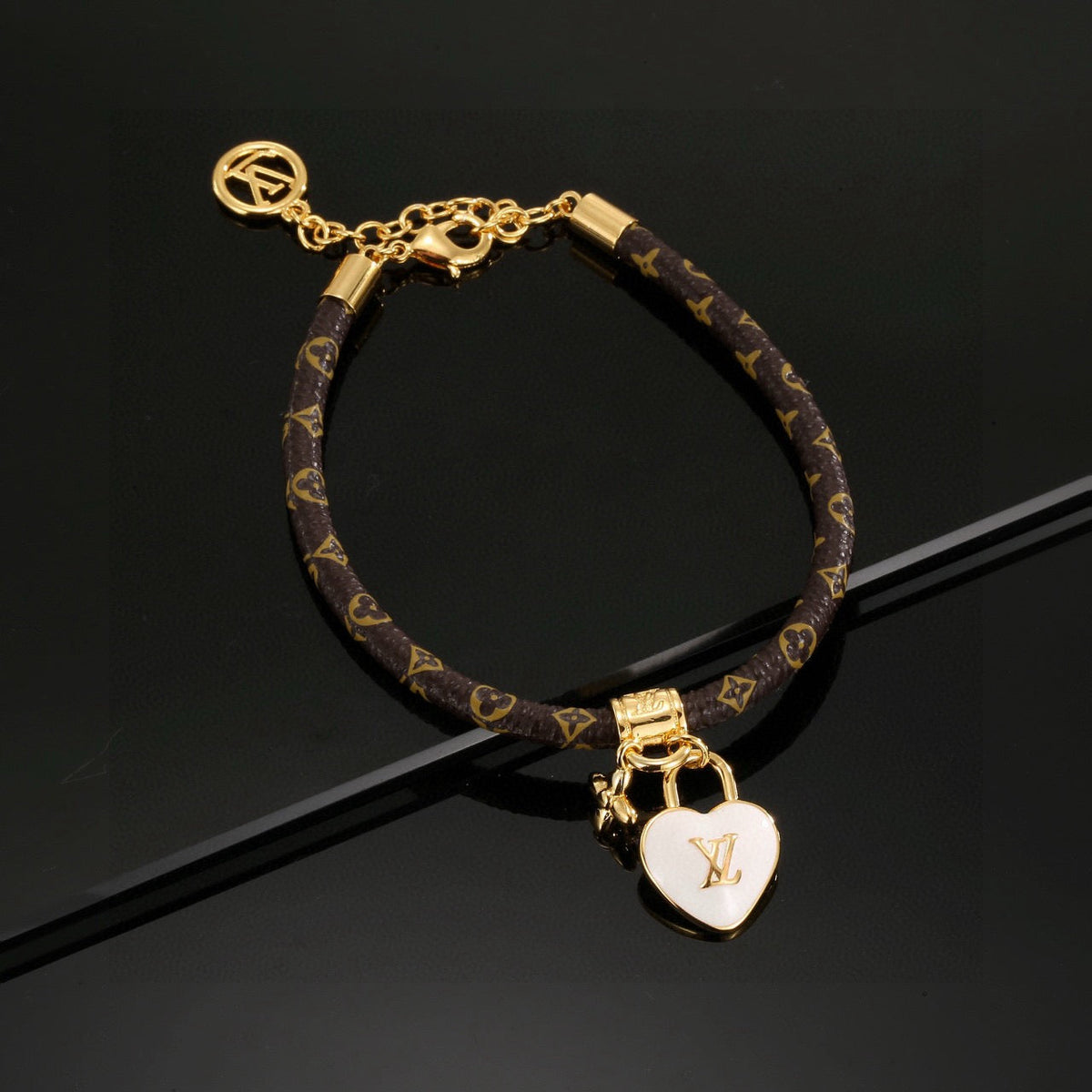 Louis Vuitton Leather Gold-Tone Fashion Accessory – Style 04 - image 4