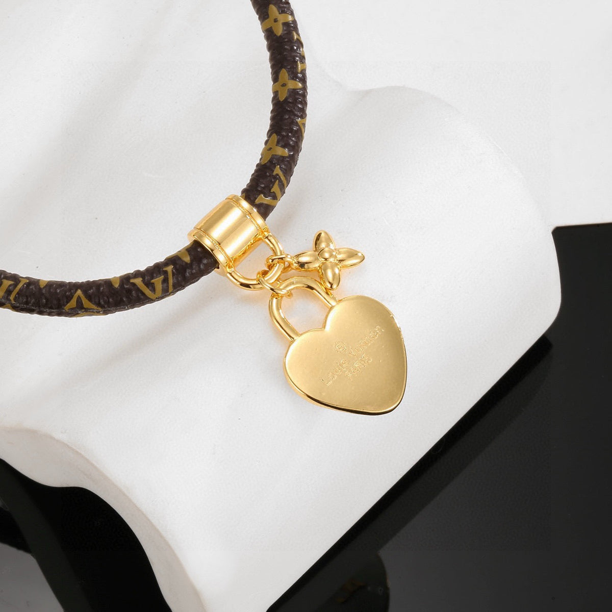 Louis Vuitton Leather Gold-Tone Fashion Accessory – Style 04 - image 6