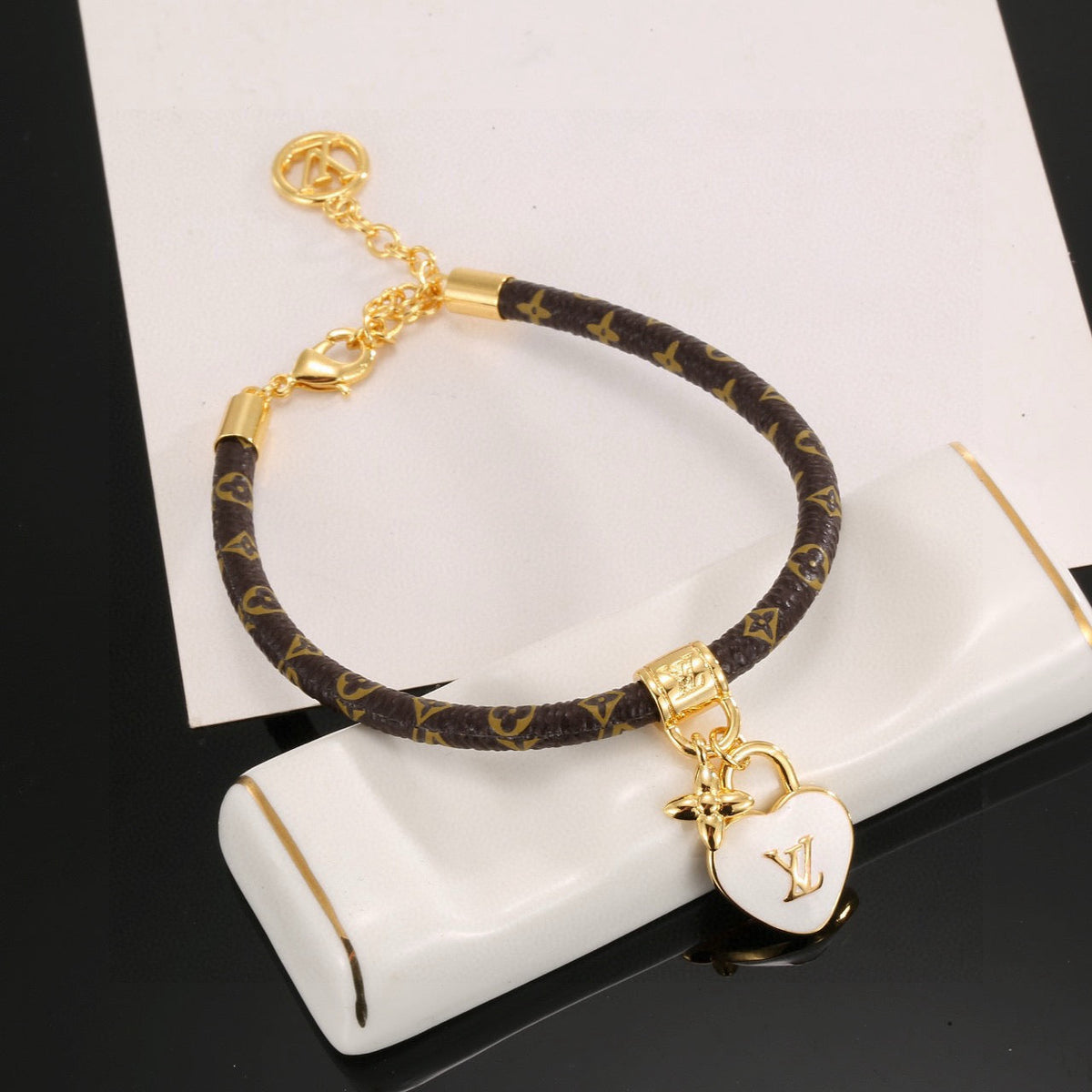 Louis Vuitton Leather Gold-Tone Fashion Accessory – Style 04 - image 3
