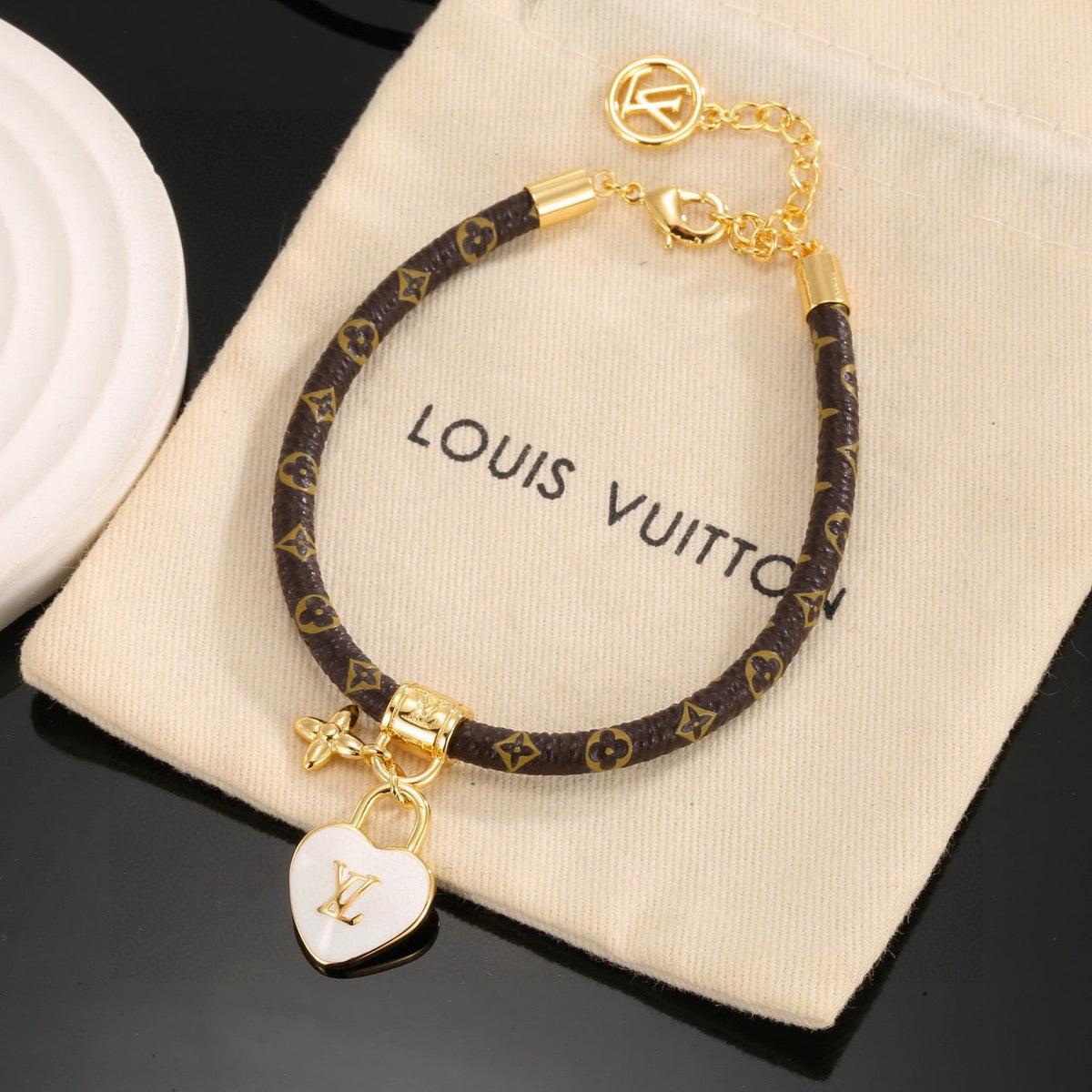 Louis Vuitton Leather Gold-Tone Fashion Accessory – Style 04 - image 1
