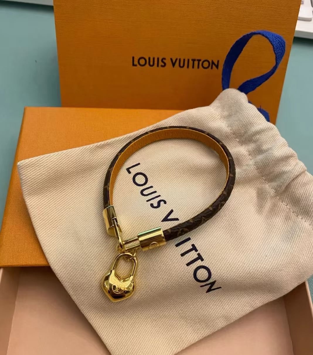 Louis Vuitton Leather Gold-Tone Fashion Accessory – Style 14 - image 4
