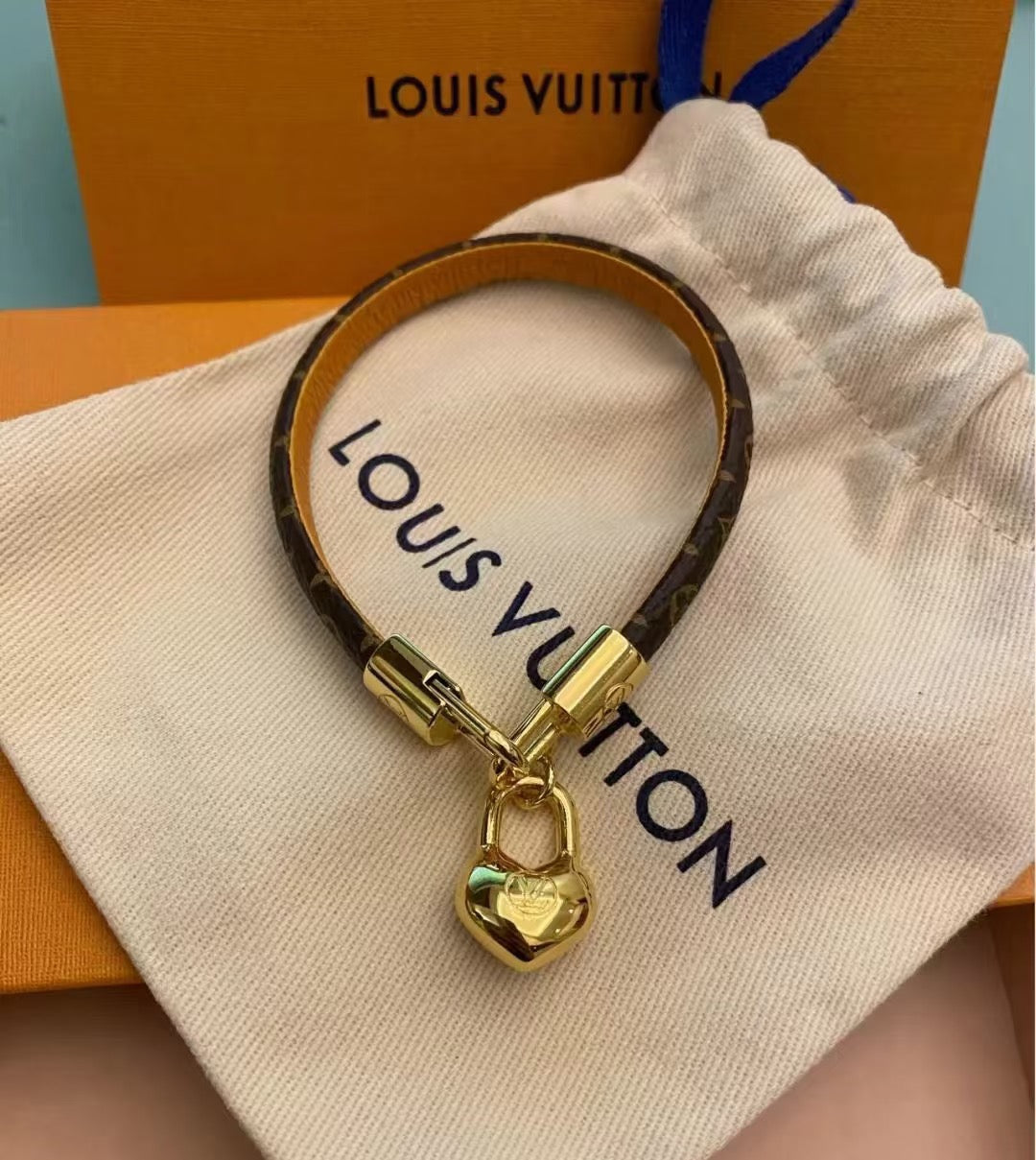 Louis Vuitton Leather Gold-Tone Fashion Accessory – Style 14 - image 3